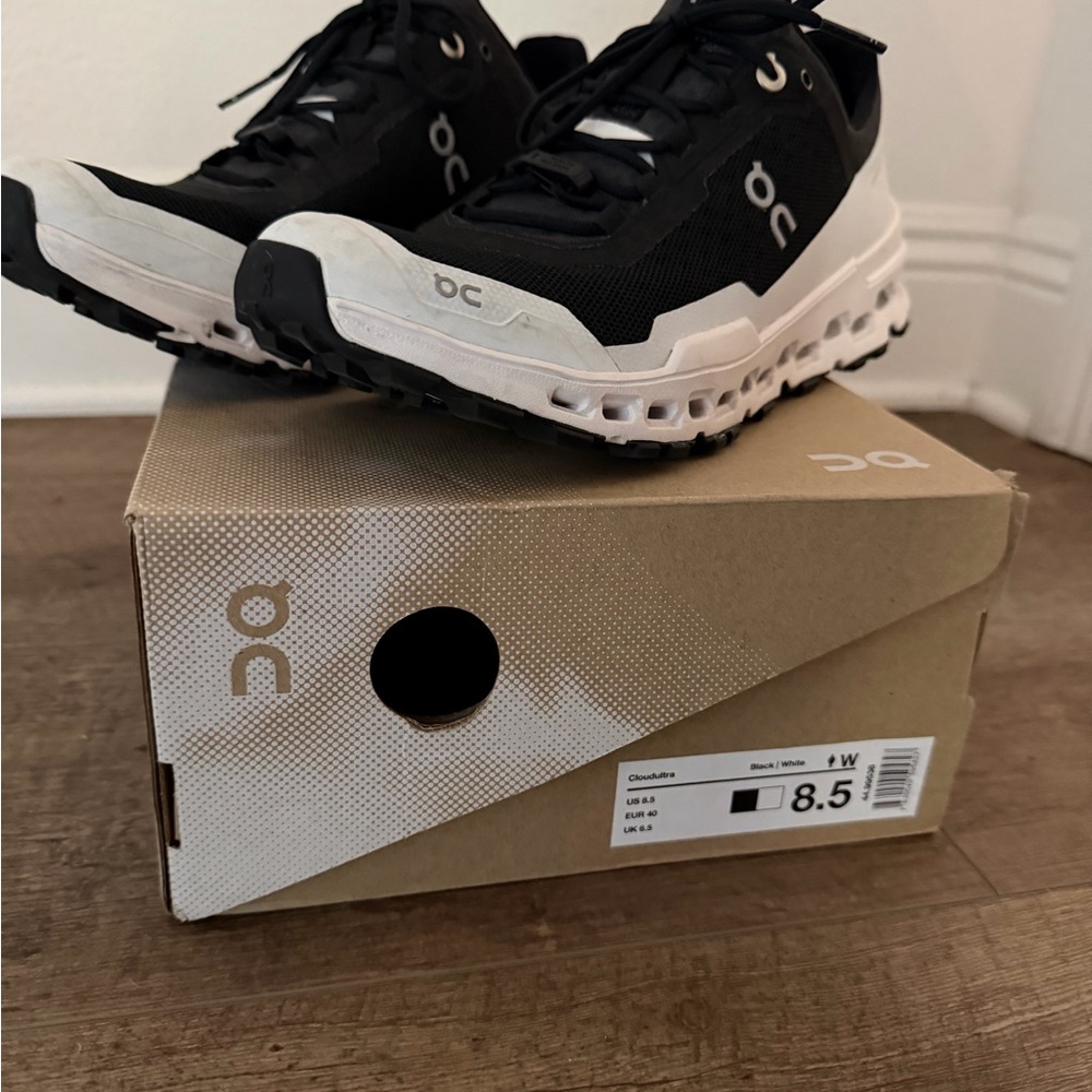 On Running Women's Black and White Athletic Shoes